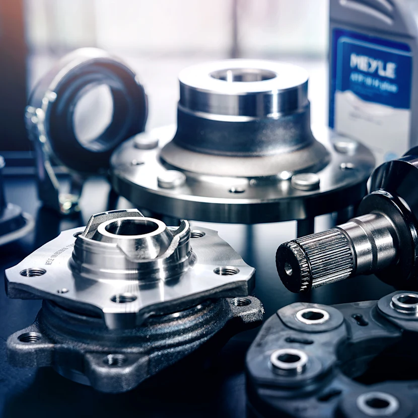 Photo of several MEYLE drive parts.
